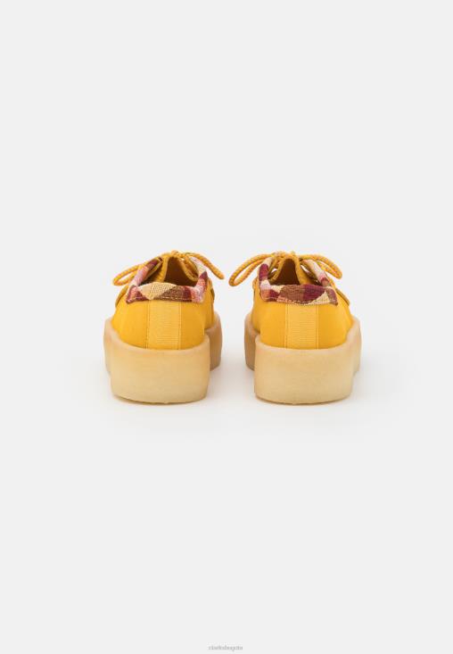 Clarks 0DX8L6947 mocasines clarks wallabee cup amarillos unisexo amarillo