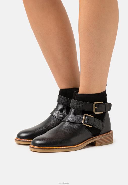 Clarks 0DX8L7072 botines clarks colonia con hebilla negros unisexo negro