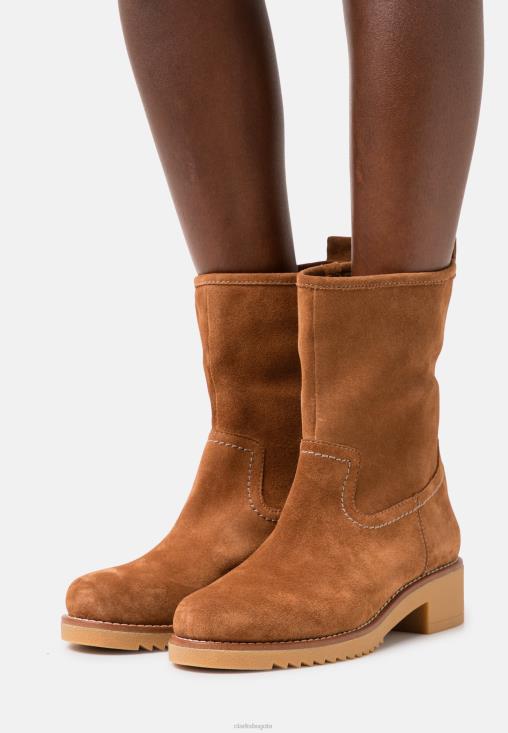 Clarks 0DX8L7089 Botines clásicos eden mid hi en tostado oscuro de Clarks unisexo bronceado oscuro