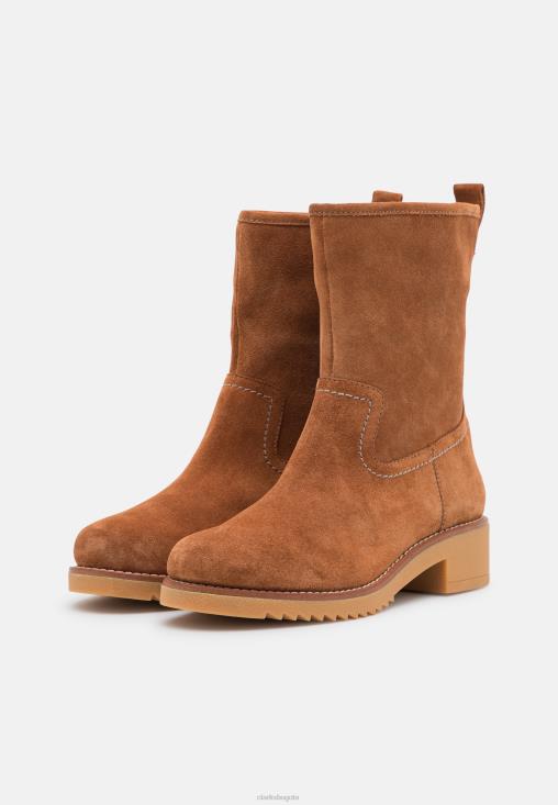 Clarks 0DX8L7089 Botines clásicos eden mid hi en tostado oscuro de Clarks unisexo bronceado oscuro