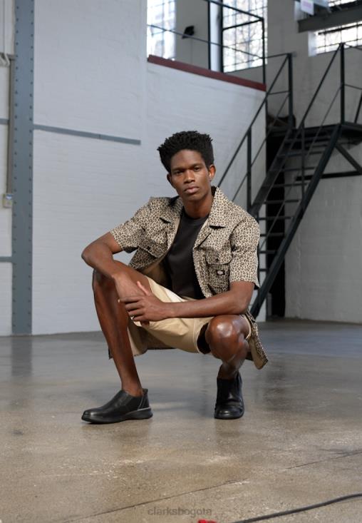 Clarks 0DX8L7161 Zapatos sin cordones elegantes negros Donaway Step de Clarks unisexo negro